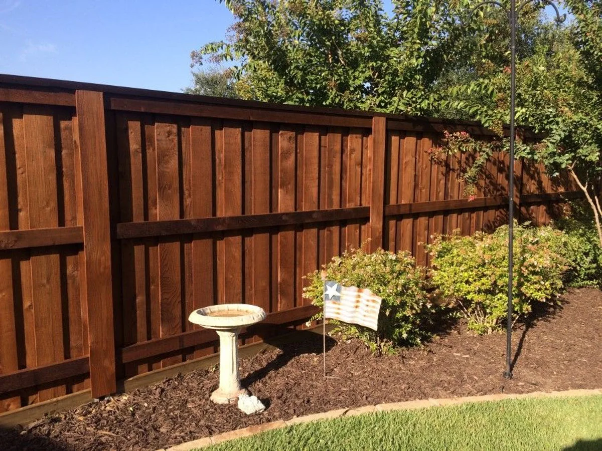 Finished wood privacy fence by Jocko Construction